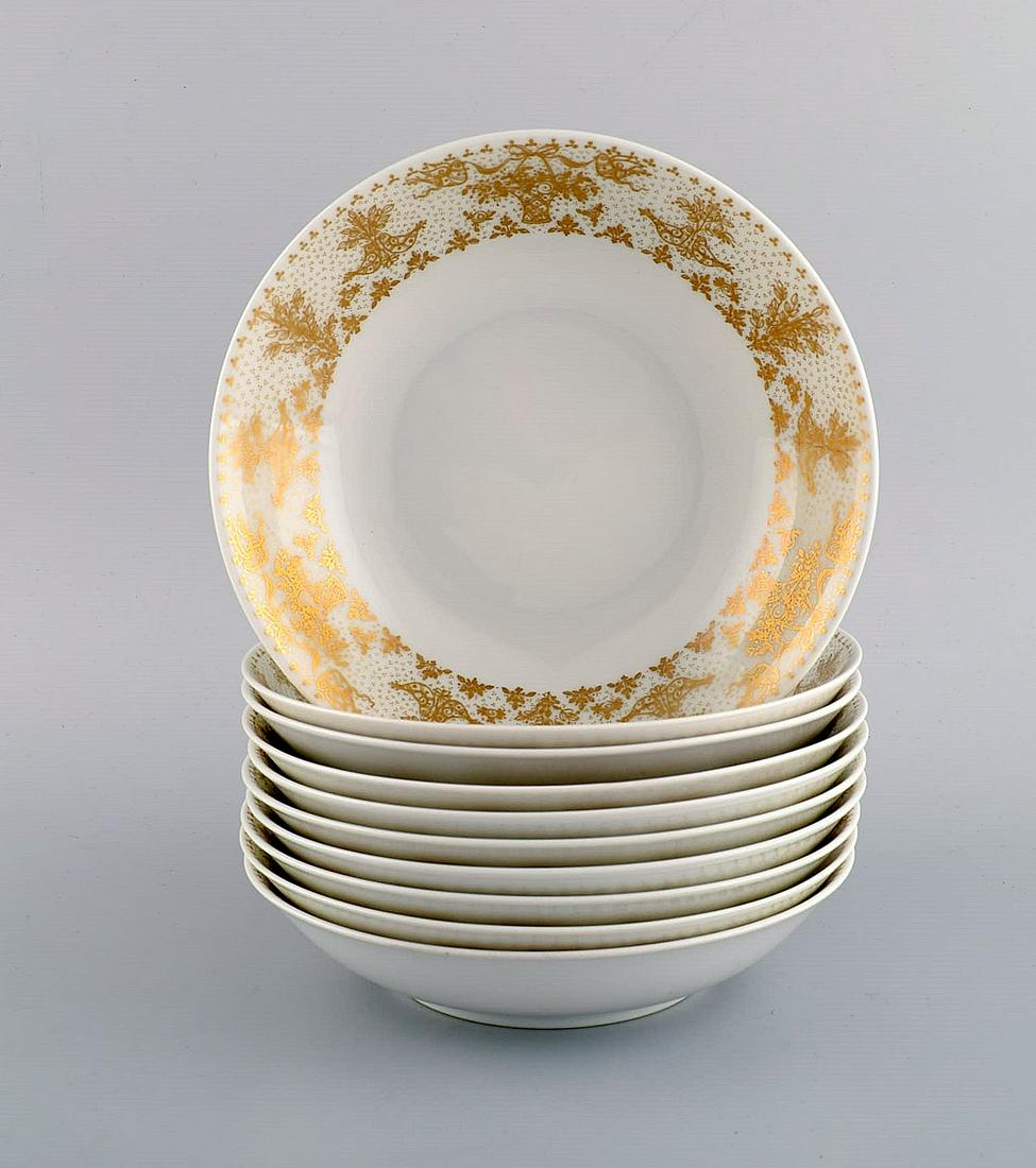 Bjørn Wiinblad for Rosenthal. 10 deep plates in porcelain with gold decoration. 1980s. (1 of 6)