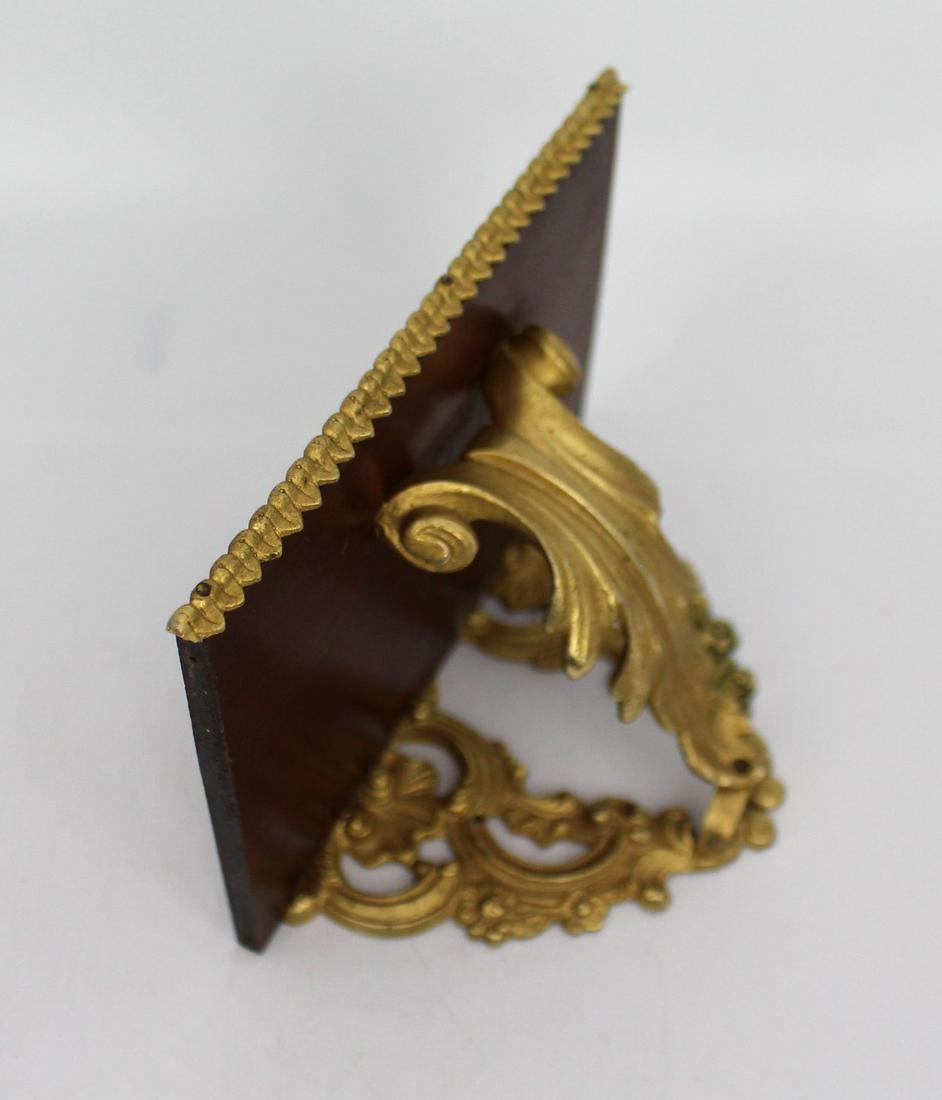 Small Mahogany & Gilt Metal Wall Bracket: Measures 14.5 x 11 x 8.5 (height) cm Reserve: $12.00 Shipping: Domestic: Flat-rate of $54.00 to anywhere within the contiguous U.S. International: Foreign shipping rates are determined by destination.