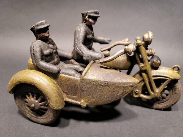 Cast Iron Toy Motorcycle Police Patrol w Side Car: 8 1/2" Long x 4" Wide Such a neat reproduction cast iron motorcycle! As you can see this heavy cast iron pull toy motorcycle was wonderfully hand painted and distressed to look like an original antiqu