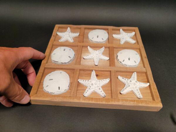Coastal Starfish Sand Dollar Tic Tac Toe Coffee Table Game: 9" x 9" 9"x9"x1" Wonderful wood board with resin starfish and sand dollars. All our items come with a 100% customer satisfaction guarantee. ... Reserve: $30.00 Shipping: Domestic: Flat-rate of $11.00