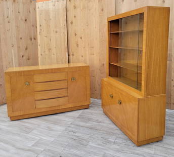 Art Deco Eliel Saarinen Buffet and Sliding Glass Door Display Cabinet for Rway - 2 Piece Set: Vintage from the 1950s Materials: wood, glass, metal, brass, mahogany Width: 59.75 inches Height: 35.25 inches Depth: 21 inches Description Art Deco Eliel Saarinen Book-Matched Blonde Mahogany