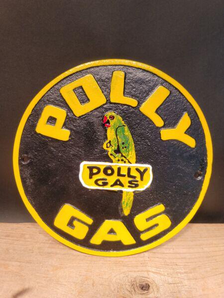 Cast Iron Round Polly Gas Oil Sign Plaque: Title: Cast Iron Round Polly Gas Oil Sign Plaque Description: 9 1/2" round 1/4" thick Such a neat reproduction cast iron plaque/sign. This sign is all solid cast iron. Hand painted, wonderful signs of