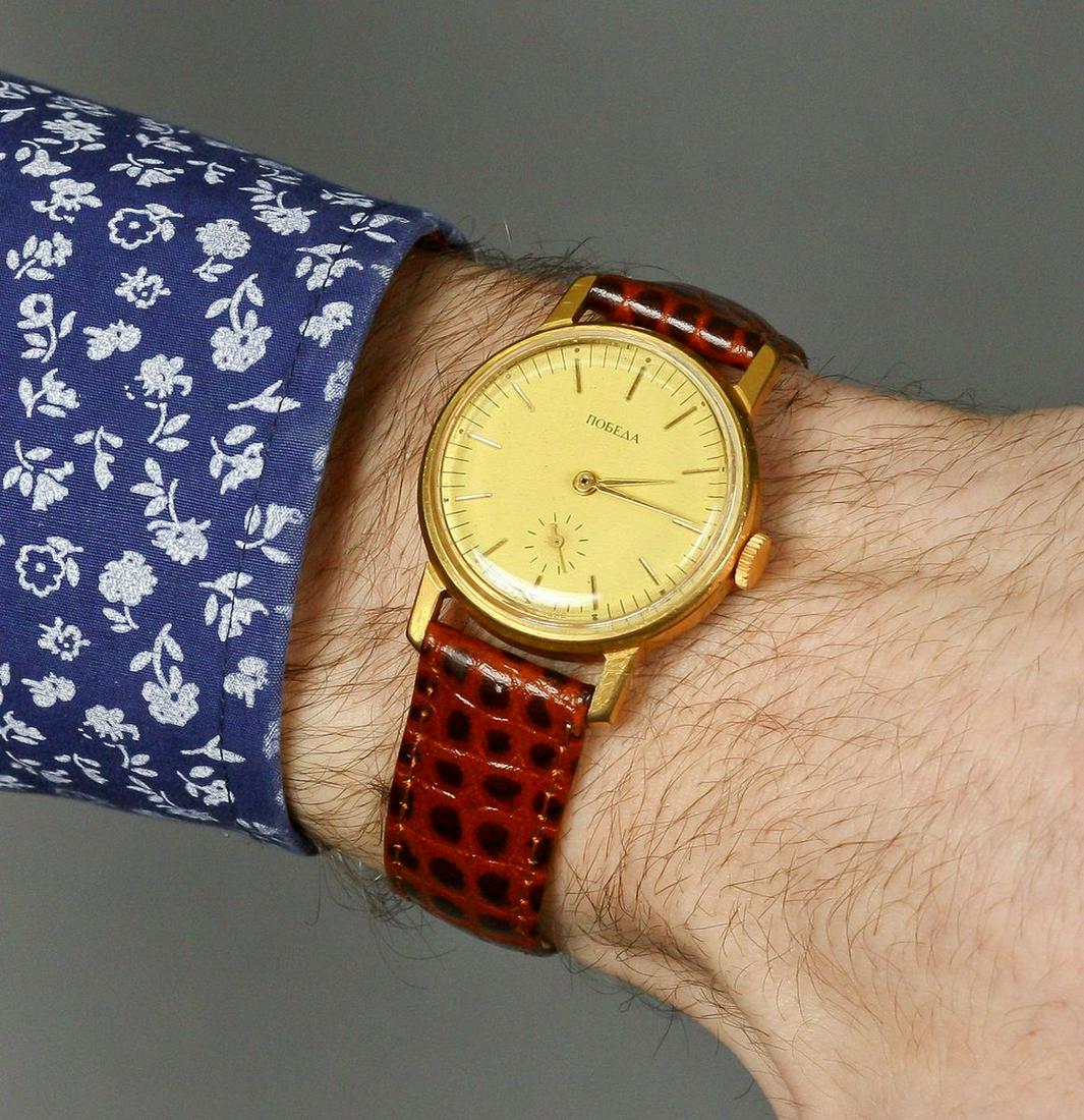 Pobeda Vintage Men Wrist Watch / Collectible Vintage Soviet Mechanical Watch Pobeda: Materials Band material: Leather Gold, Stainless steel Pobeda vintage men wrist watch russian antique unisex white USSR watches. Pobeda Vintage Men Wrist Watch. Collectible Vintage Soviet Mechanical W
