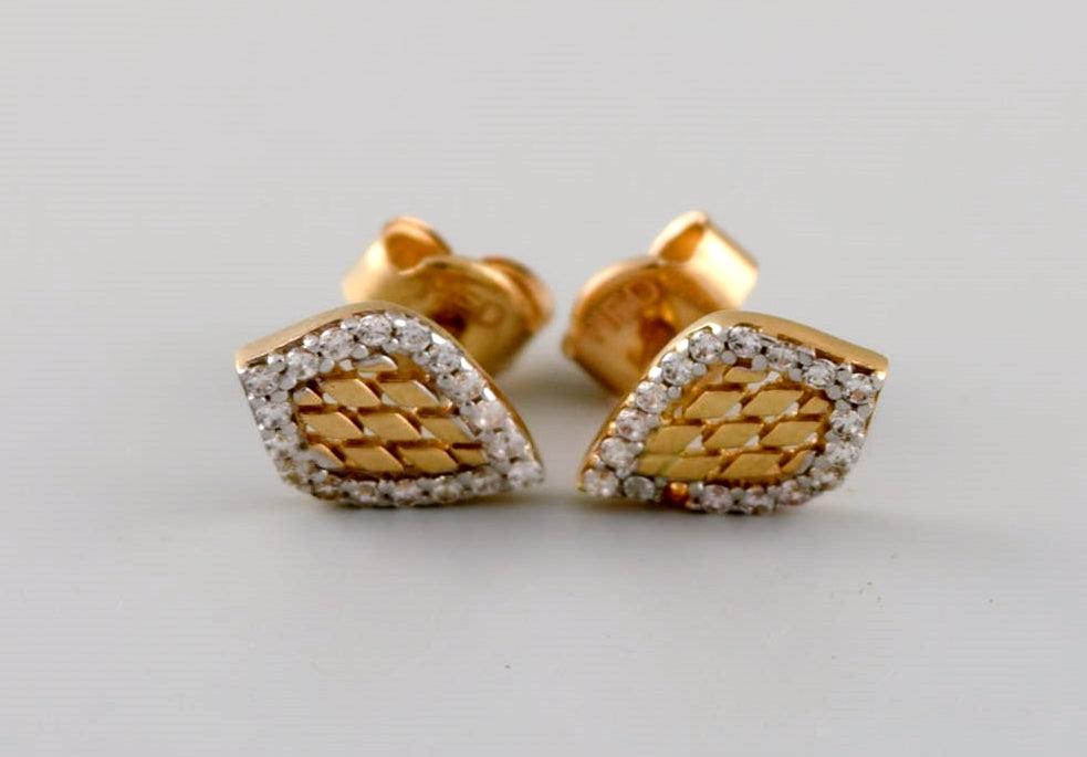 Danish jeweler. A pair of ear studs in 14 carat gold adorned with bright diamonds. Late 20th (1 of 5)