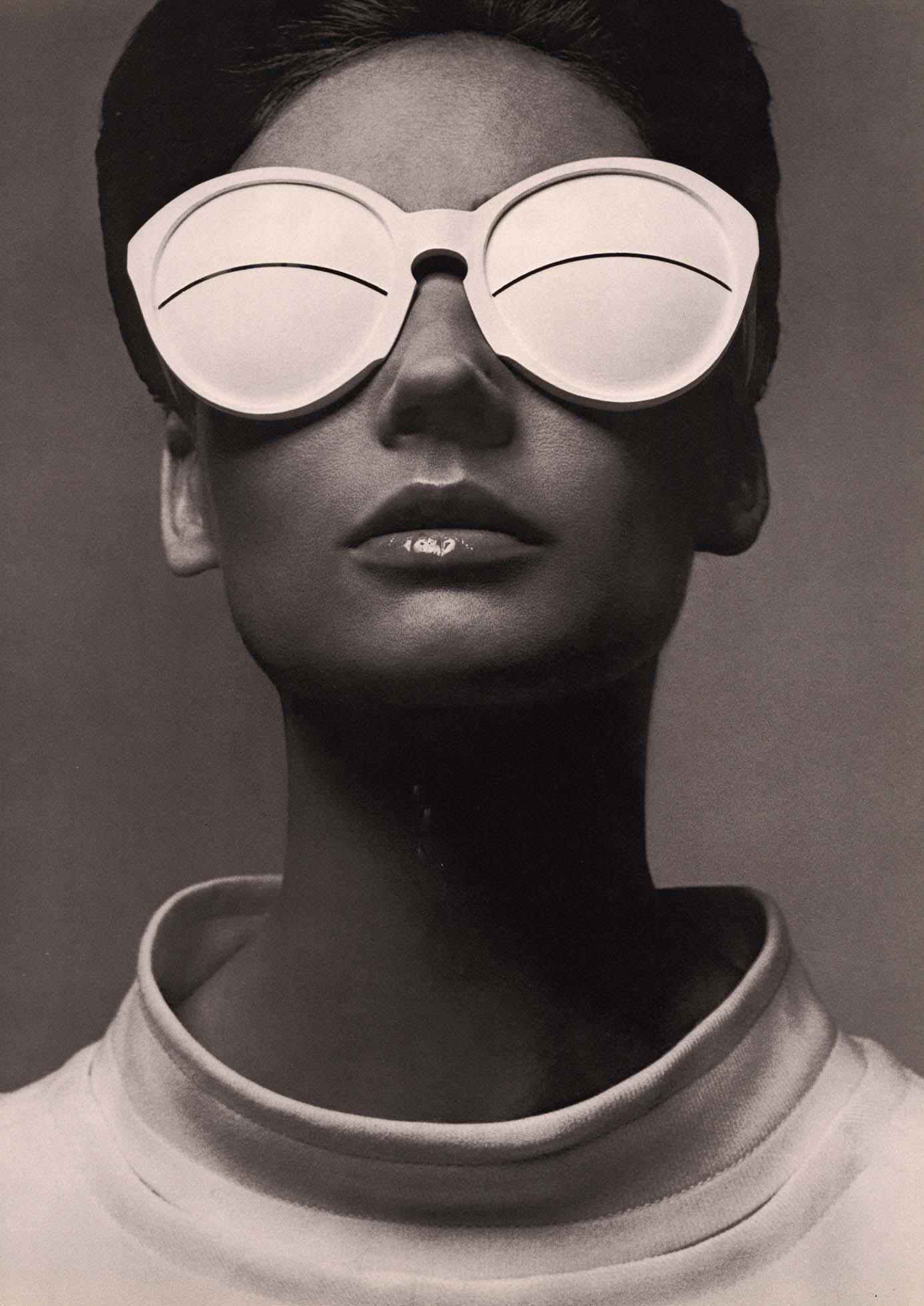 RICHARD AVEDON - Courreges Sunglasses, Paris, 1965: Artist:RICHARD AVEDON Print Title: Courreges Sunglasses, Paris, 1965 Medium: Photoengraving Printed in 1970s in the USA Image size (inches) approx. 13.5 x 9.5” Richard Avedon (1923-2004) was an 