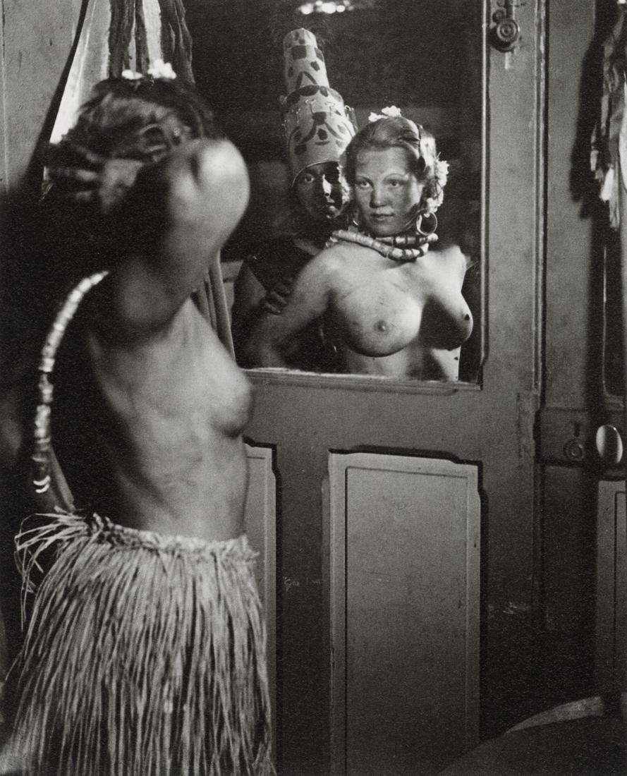 BRASSAI - A Couple Getting "Dressed", 1931: Artist: Brassai Title: The Bal Des Quat'z Arts, A Couple Getting "Dressed", 1931 Medium: Photo Litho, 2000, Germany Dimensions: 5.95x7.4" Description: Heat Wax Mounted on 8.5x11" Conservation Board Ar