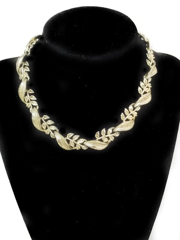 Vintage Haute Coro Couture Gold Tone Vine Necklace: Vintage Haute Coro Couture Gold Tone Vine Necklace. Coro C - marking. Weighs 40 grams. Necklace measures 11" with 4.5" extender. In good vintage condition with finish wear. Reserve: $20.00 Shipping: D