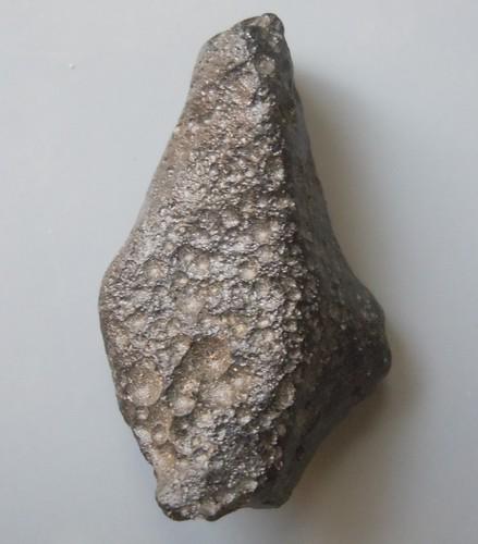 PHILIPPINITE TEKTITE - FROM METEORITE IMPACT: Title: PHILIPPINITE TEKTITE - FROM METEORITE IMPACT Origin: Paracale, Camarines Norte, Luzon, Philippines Size: 2.5x1x1 cm / 3 gram Description: wedge shaped philippinite tektite. one end chipped Rese