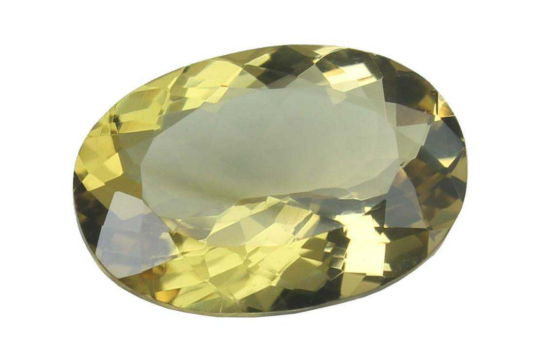 9.28 Cts Natural Lemon Quartz: No Reserve! Title: 9.28 Cts Natural Lemon Quartz Additional Information: Gemstone : Natural Lemon Quartz Shape and cut : Oval Cut Origin : Africa Weight : 9.28 carats Measurements : 18x13 mm Color : Y