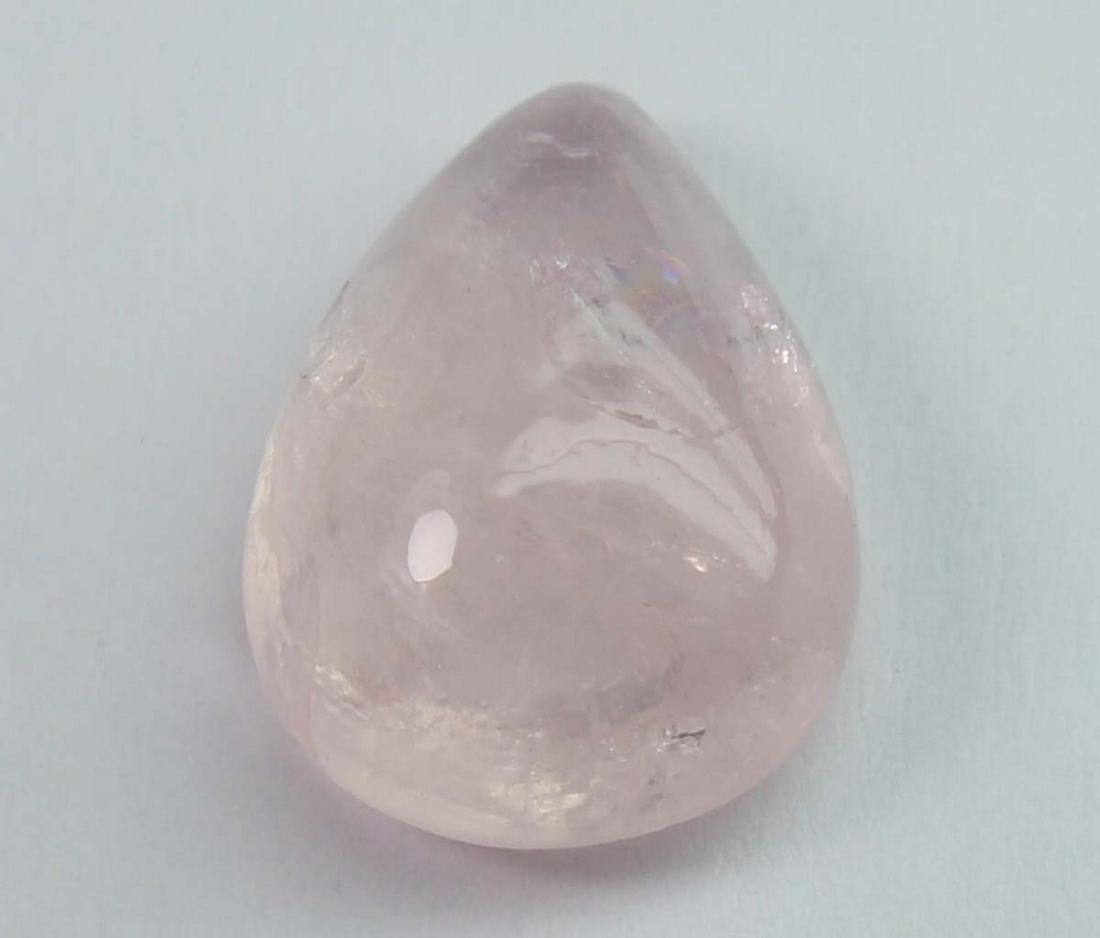 3.85 cts Natural Morganite: No Reserve! Title: 3.85 cts Natural Morganite Additional Information: Gemstone : Natural Morganite Shape and Cut : Pear Cabochon Weight : 3.85 carats Measurements : 12.59x8.96x5.06 mm Color : Peach Tr