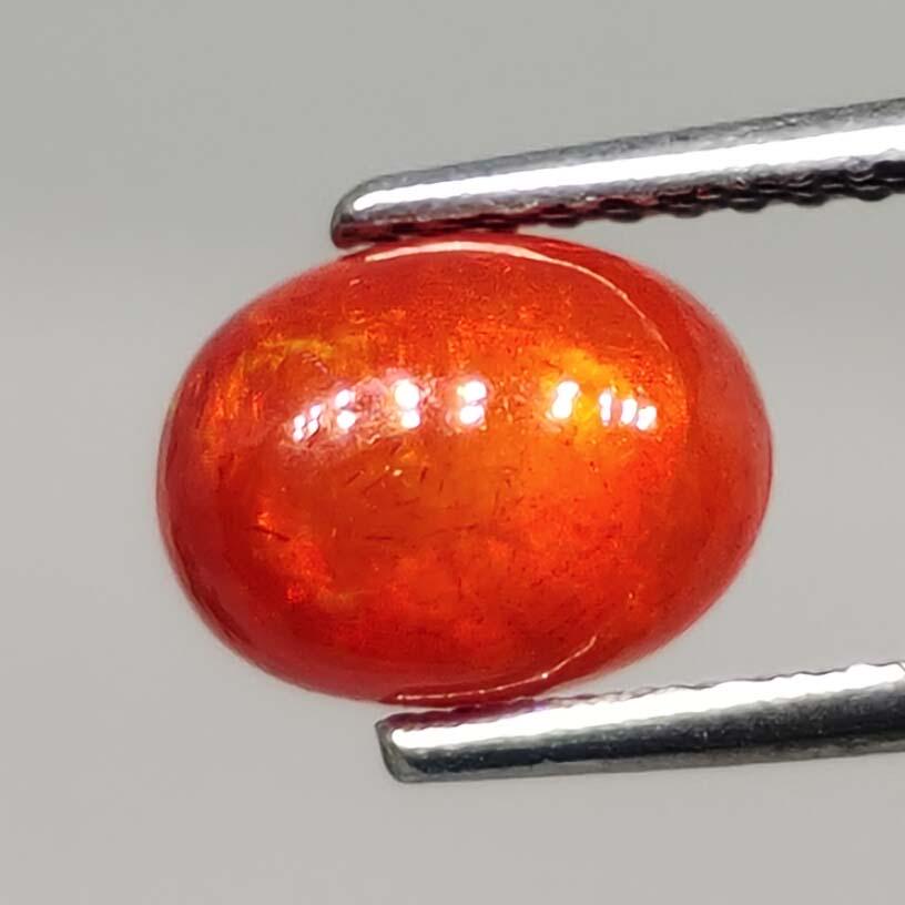 1 ct Natural Ethiopian Orange Opal: No Reserve! Gemstones: Ethiopian Opal\t Carat Weights: 1 ct \t Size/Dimensions: 8 X 6 mm\t Treatment: Dyed Shipping: Domestic: Flat-rate of $7.00 to anywhere within the contiguous U.S. International: