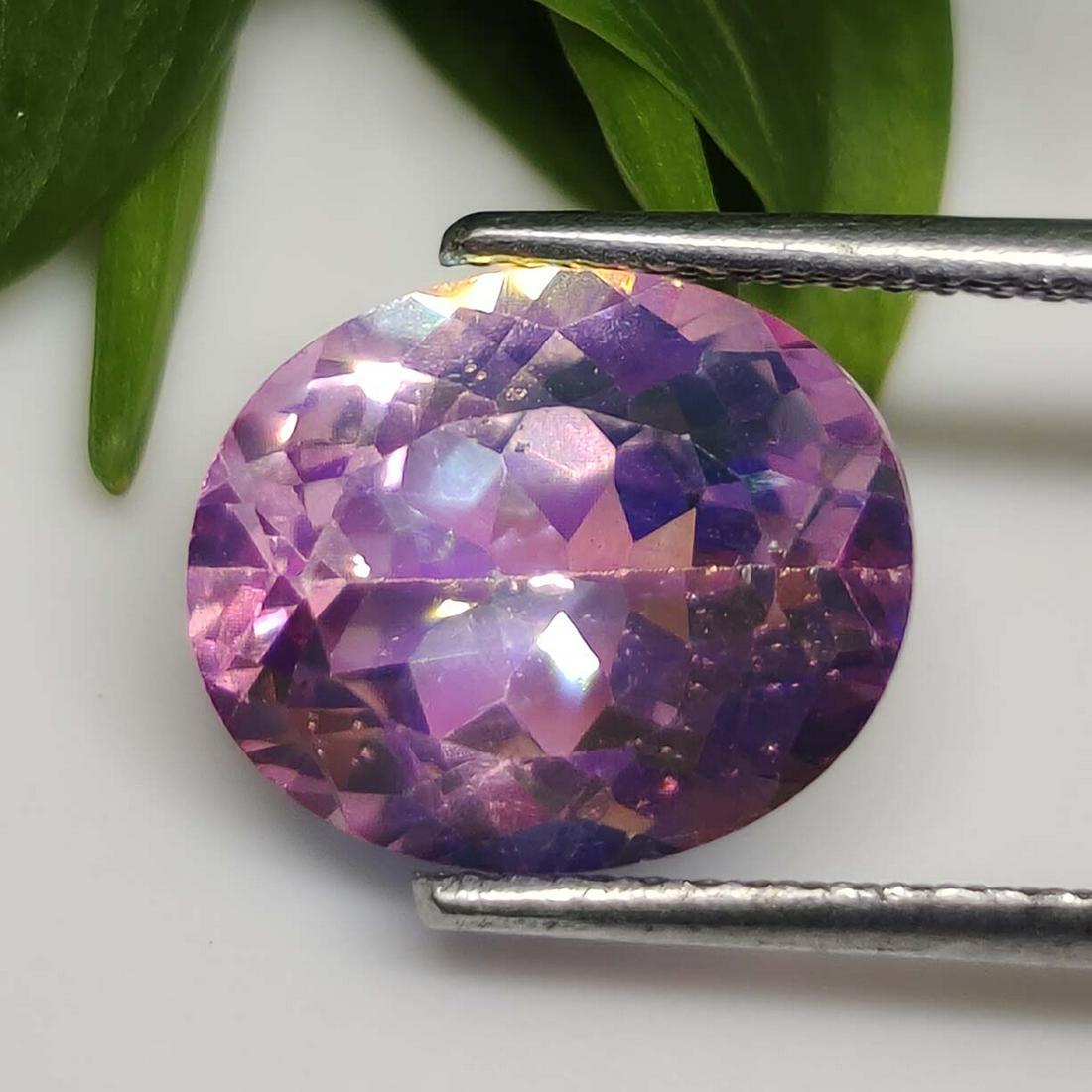 4.50 ct Rare Natural Charisma Pink Mystic Topaz-Top Grade: No Reserve! Gemstones: Natural Topaz\t Carat Weights: 4.50 ct \t Size/Dimensions: 11 X 9 mm\t Treatment: Coated Shipping: Domestic: Flat-rate of $7.00 to anywhere within the contiguous U.S. Internatio