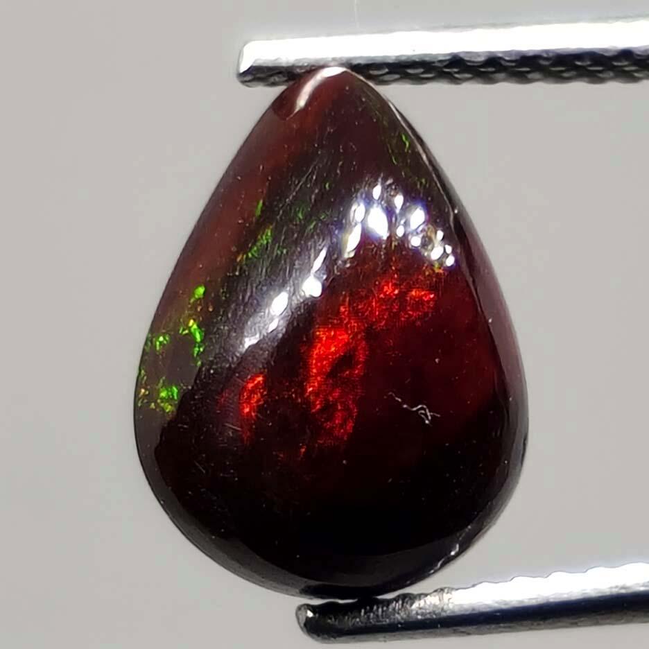 1.90 ct Natural Ethiopian Red Fire Opal: No Reserve! Gemstones: Ethiopian Opal\t Carat Weights: 1.90 ct \t Size/Dimensions: 11 X 8 mm\t Treatment: Dyed Shipping: Domestic: Flat-rate of $7.00 to anywhere within the contiguous U.S. Internation