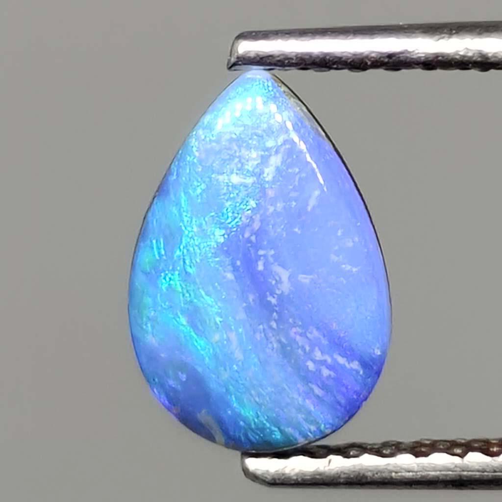 0.90 ct Australian Doublet Opal: No Reserve! Title: 0.90 ct Australian Doublet Opal Materials & Techniques: Opal Shipping: Domestic: Flat-rate of $7.00 to anywhere within the contiguous U.S. International: Foreign shipping rates are 