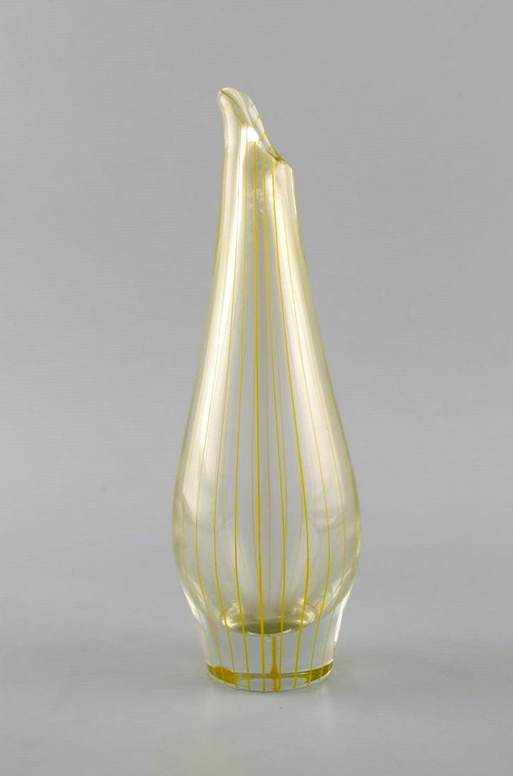 Bengt Orup (1916-1996) for Johansfors. Strict vase in clear mouth-blown art glass with yellow: Title: Bengt Orup (1916-1996) for Johansfors. Strict vase in clear mouth-blown art glass with yellow vertical stripes. 1960s. Description: Bengt Orup (1916-1996) for Johansfors. Strict vase in clear m