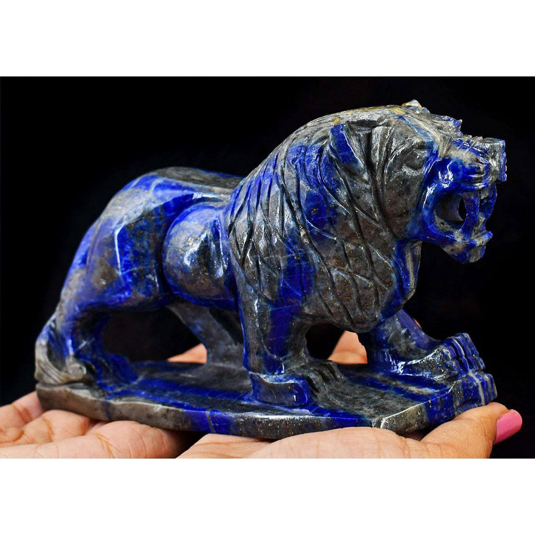 Exclusive Lapis Lazuli Hand Carved Genuine Crystal Lion: Artisian Carved Lapis Lazuli Carving of Lion. The beautiful masterpiece is carved from a single Lapis Lazuli Rough. It takes about 6-7 days to carve such beautiful masterpieces.The same is complete ca