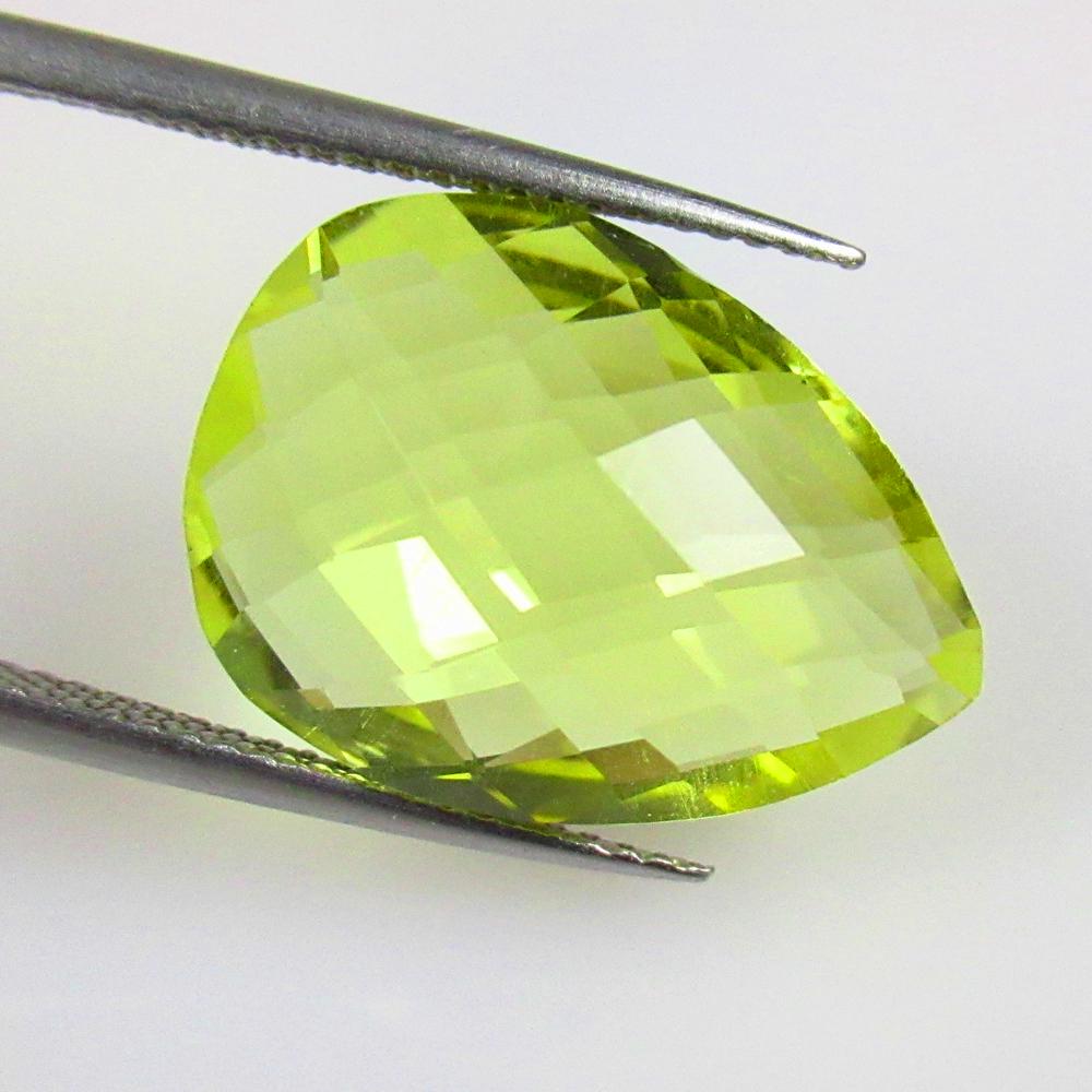 12.41 Ctw Natural Lemon Quartz Pear Checkerboard Cut: No Reserve! Title: 12.41 Ctw Natural Lemon Quartz Pear Checkerboard Cut Stone Clarity: VVS Gemstones: Natural Lemon Quartz Carat Weights: 12.41 Size/Dimensions: 18.60 x 13.60 x 8.70 mm Additional Info