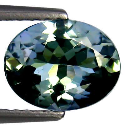 Natural Tanzanite 0.56ct Oval AAA Greenish/Yellowish/Bluish/Silver VVS: Title: Natural Tanzanite 0.56ct Oval AAA Greenish/Yellowish/Bluish/Silver VVS Additional Information: 1 x Natural Tanzanite 0.56ct Oval AAA Greenish/Yellowish/Bluish/Silver VVS - Shape: Oval - Weight:
