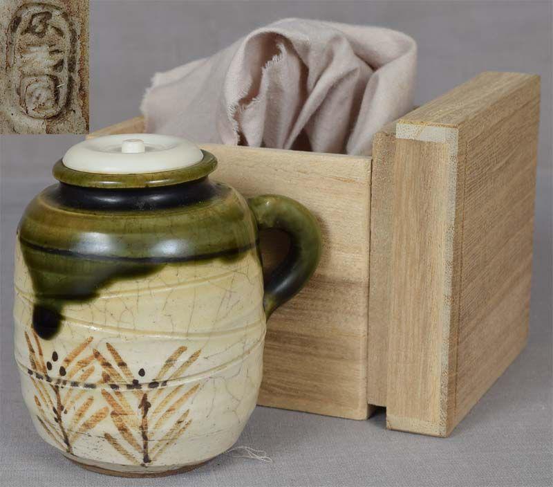 19c Japanese ORIBE tea ceremony CHAIRE marked: Late Meiji (1880s-1910s) Japanese pottery Oribe ware chaire (tea caddy for storing powdered green tea used in tea ceremony) with handle. Characteristic rich green glaze, underglaze brown painting of p