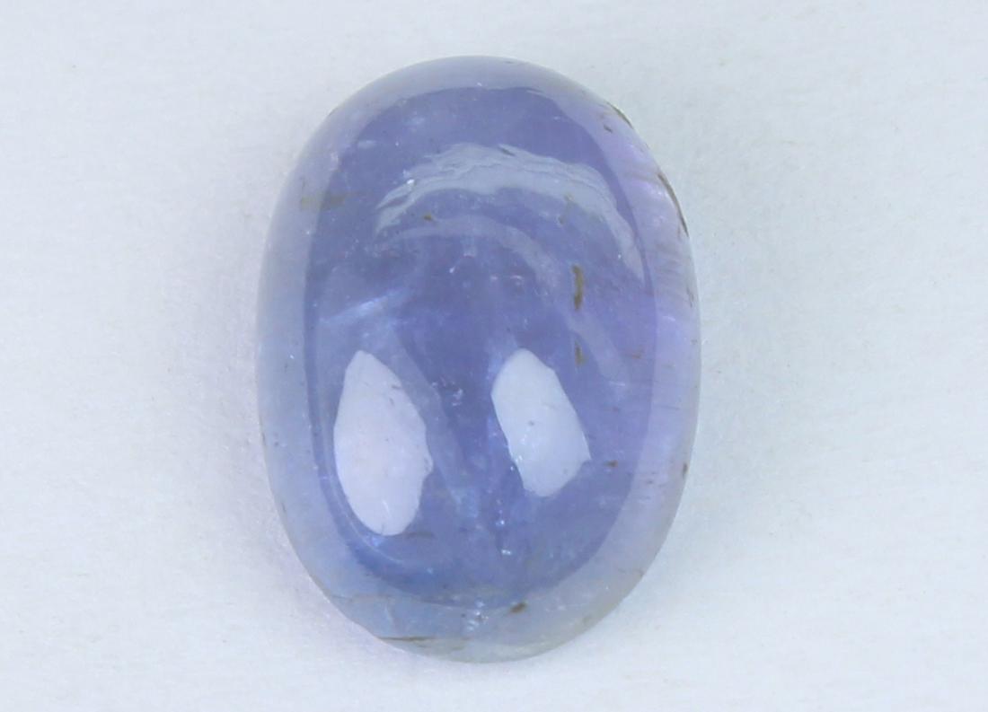 2.89 Cts Natural Tanzanite: No Reserve! Gemstone : Natural Tanzanite Shape and cut : OvalCabochon Weight : 2.89 Carats Measurements : 10x7 mm Color : Violetish Blue Transprancy : Transparent Treatment : No Treatment Origin : Ind