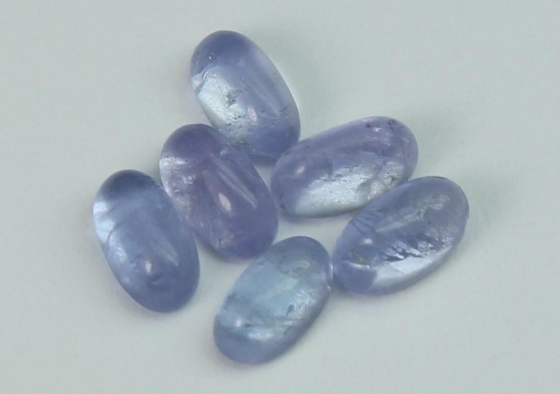 1.70 cts Natural Tanzanite: No Reserve! Gemstone : Natural Tanzanite Origin: Tanzania Weight : 1.70 carats Dimensions : 4.93x2.80x1.99 mm 4.81x2.66x1.94 mm Shape/Cut: Oval Cabochon Color : Violet Number of Stone : 6 Transparency
