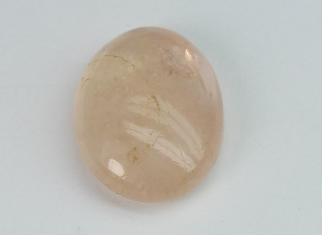 4.71 cts Natural Morganite: No Reserve! Gemstone : Natural Morganite Shape and Cut : Oval Cabochon Weight : 4.71 carats Measurements : 13.66x9.96x4.63 mm Color : Peach Transparency : Transparent Treatment : No Treatment Origin :