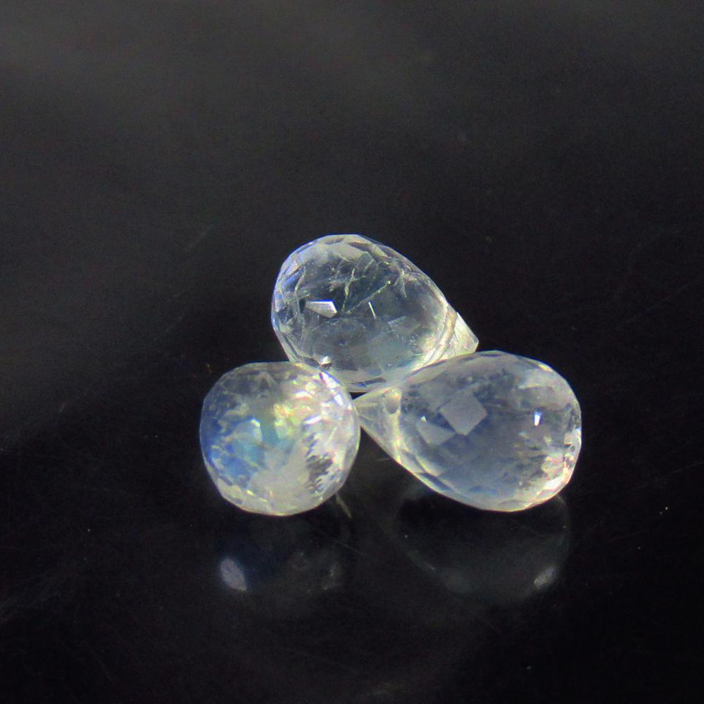 3.91 Ctw Natural 3 Drilled Blue Moonstone Pear Drop Beads: No Reserve! Title: 3.91 Ctw Natural 3 Drilled Blue Moonstone Pear Drop Beads Stone Clarity: Semi-Transparent Gemstones: Natural Moonstone Beads Carat Weights: 3.91 Size/Dimensions: 7.6x5.3 - 8.0x5.4 m
