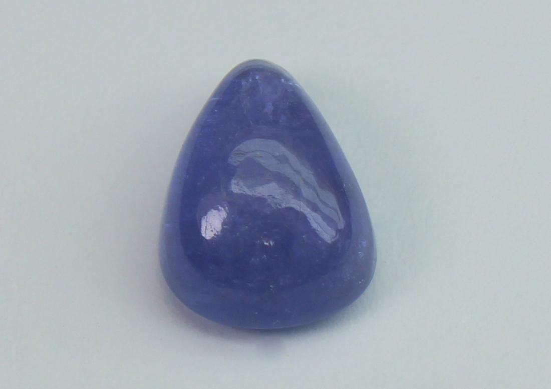 2.66 Cts Natural Tanzanite Lot: No Reserve! Gemstone : Natural Tanzanite Origin: Tanzania Weight : 2.66 carats Dimensions : 10x7 mm Shape/Cut: Pear Cabochon Color : Violet Transparency: transparent Treatment: none Shipping: Dom