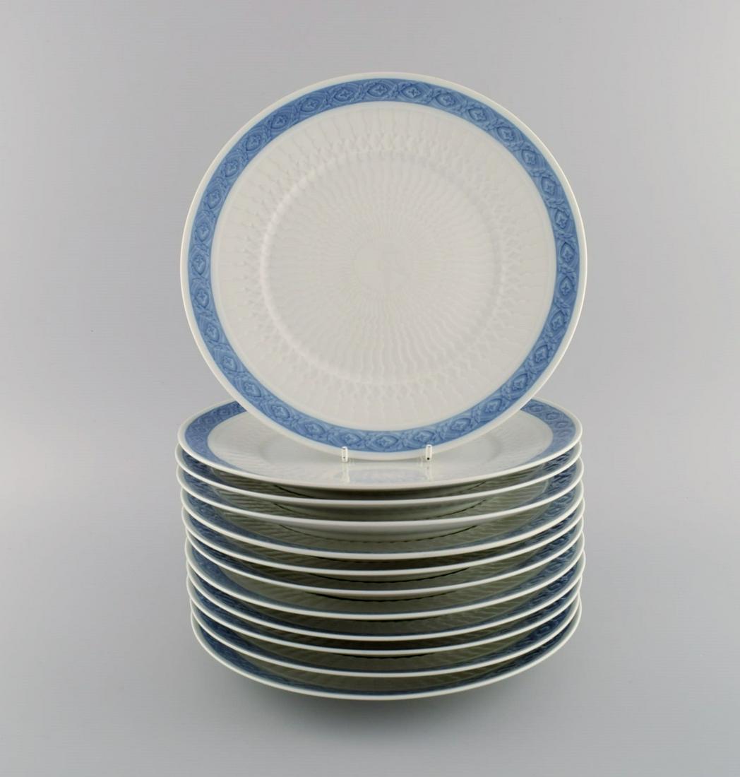 Twelve Royal Copenhagen Blue Fan dinner plates. 1960s / 70s. Model number 1212/11519. Designed by: Twelve Royal Copenhagen Blue Fan dinner plates. 1960s / 70s. Model number 1212/11519. Designed by Arnold Krog in 1909. Diameter: 25.5 cm. In excellent condition. Stamped. 1st factory quality. Reserve: