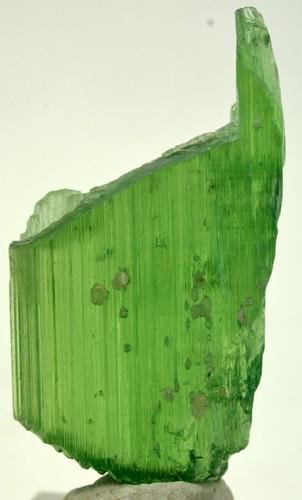 16 Grams Lush Green Terminated Kunzite Crystal: Title: 16 Grams Lush Green Terminated Kunzite Crystal Weight: 16 Grams Origin: Afghanistan Materials: Crystal Size: 52*27*7 MM Description: Treatment: Heated Reserve: $30.00 Shipping: Domestic: Flat-r