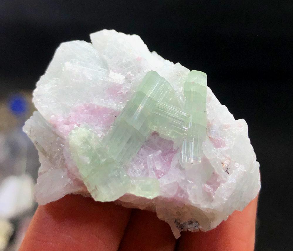 Bi Color Tourmaline Specimen from Afghanistan 23 gram = 38*25*15 mm: Materials: Gem type: Tourmaline Description Bi Color Tourmaline Specimen from Afghanistan 23 gram = 38*25*15 mm Weight : 23 gram Dimension : 38*25*15 mm Origin : Afghanistan Treatment : Natural DHL Sh