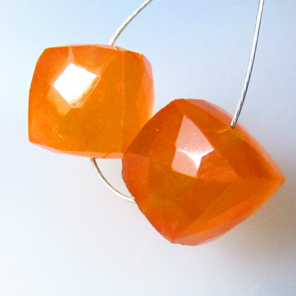 8.09 Ctw Natural 2 Orange Carnelian Square Beads: No Reserve! Title: 8.09 Ctw Natural 2 Orange Carnelian Square Beads Stone Clarity: Semi-Transparent Gemstones: Natural Carnelian Beads Carat Weights: 8.09 Size/Dimensions: 7.50 x 7.20 x 7.20 mm / 2 Pc