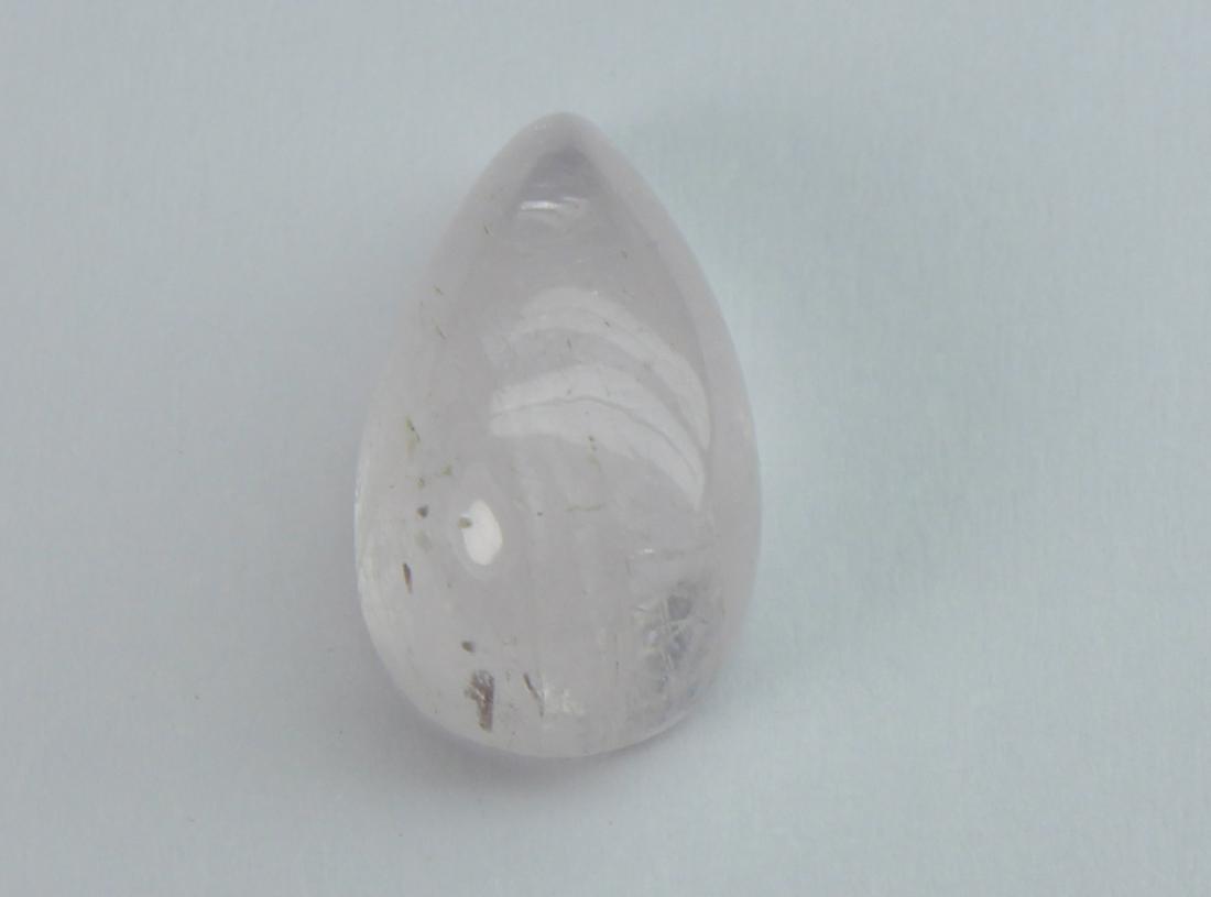 4.29 cts Natural Morganite: No Reserve! Title: 4.29 cts Natural Morganite Additional Information: Gemstone : Natural Morganite Shape and Cut : Pear Cabochon Weight : 4.29 carats Measurements : 12.77x7.38x5.83 mm Color : Peach Tr