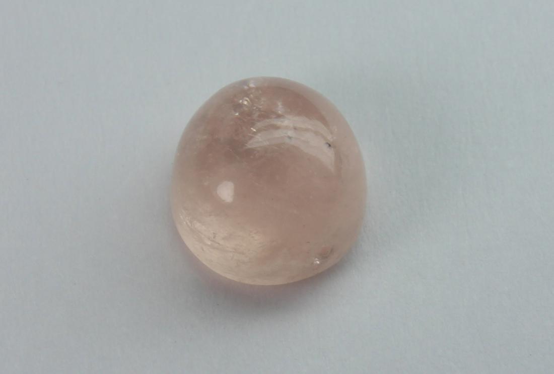 2.60 cts Natural Morganite: No Reserve! Title: 2.60 cts Natural Morganite Additional Information: Gemstone : Natural Morganite Shape and Cut : Oval Cabochon Weight : 2.60 carats Measurements : 8.60x7.71x5.27 mm Color : Peach Tra
