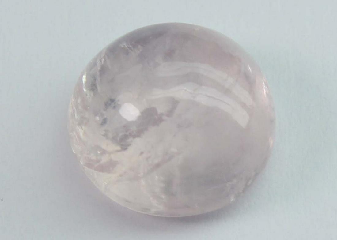 4.27 cts Natural Morganite: No Reserve! Title: 4.27 cts Natural Morganite Additional Information: Gemstone : Natural Morganite Shape and Cut : Round Cabochon Weight : 4.27 carats Measurements : 9.84-9.68x5.84 mm Color : Peach Tr