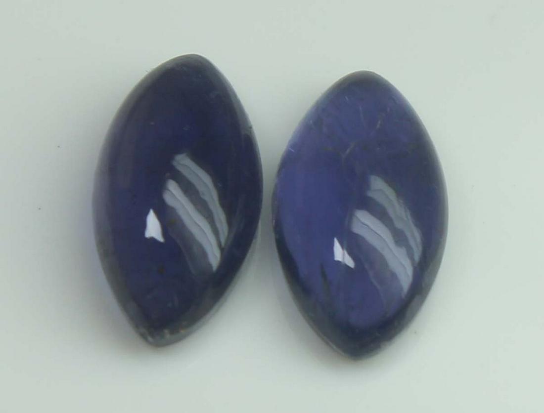 2.73 Cts Natural Iolite Lot: No Reserve! Title: 2.73 Cts Natural Iolite Lot Additional Information: Gemstone : Natural Iolite Shape and Cut : Marquies Cabochan Weight : 2.73 carats Measurements : 10.32x5.42x3.71 mm, 10.29x5.64x3.