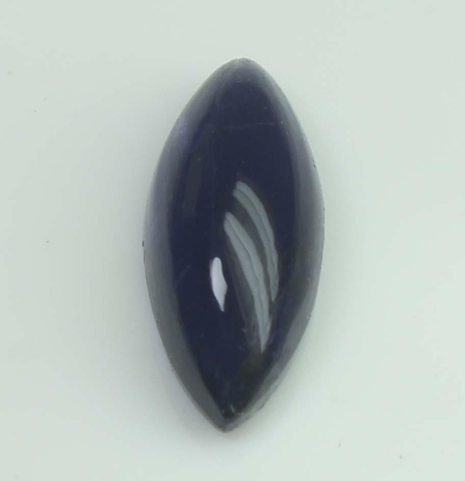 1.87 Cts Natural Iolite: No Reserve! Title: 1.87 Cts Natural Iolite Additional Information: Gemstone : Natural Iolite Shape and Cut : Marquies Cabochan Weight : 1.87 carats Measurements : 12.68x5.39x4.28 mm Color : Violet Tra