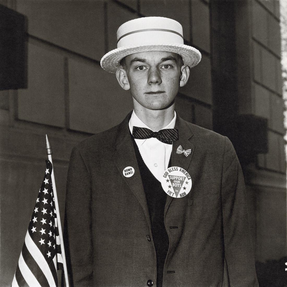 DIANE ARBUS - Boy with a Straw Hat at Pro-War Parade (1 of 1)