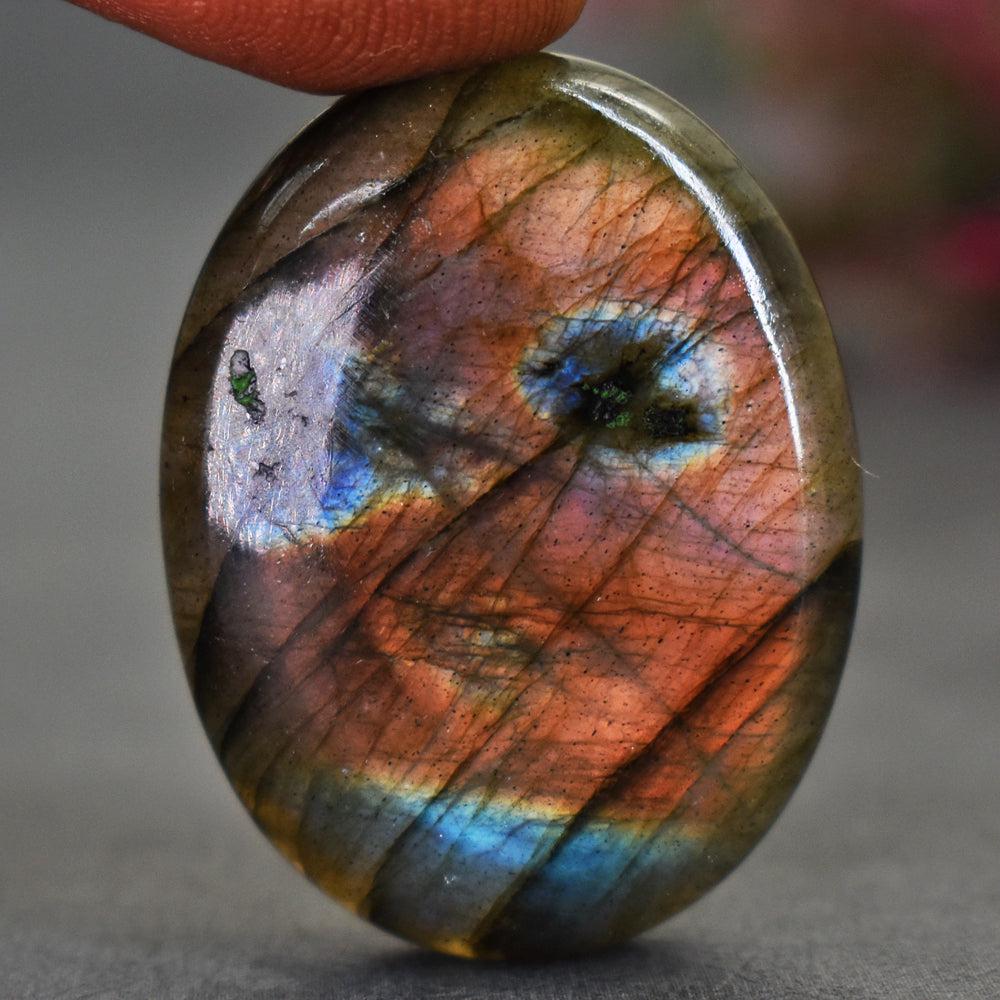 56 Carats Genuine Orange Flash Labradorite Gemstone: Product : Natural Orange Flash Labradorite Gemstone Weight : 56.00 Carats Color : As seen in picture Treatment : None Dimensions : 33 X 24 X 06 MM Clarity : Opaque Code : 33 C4 ... Reserve: $1.00 Ship