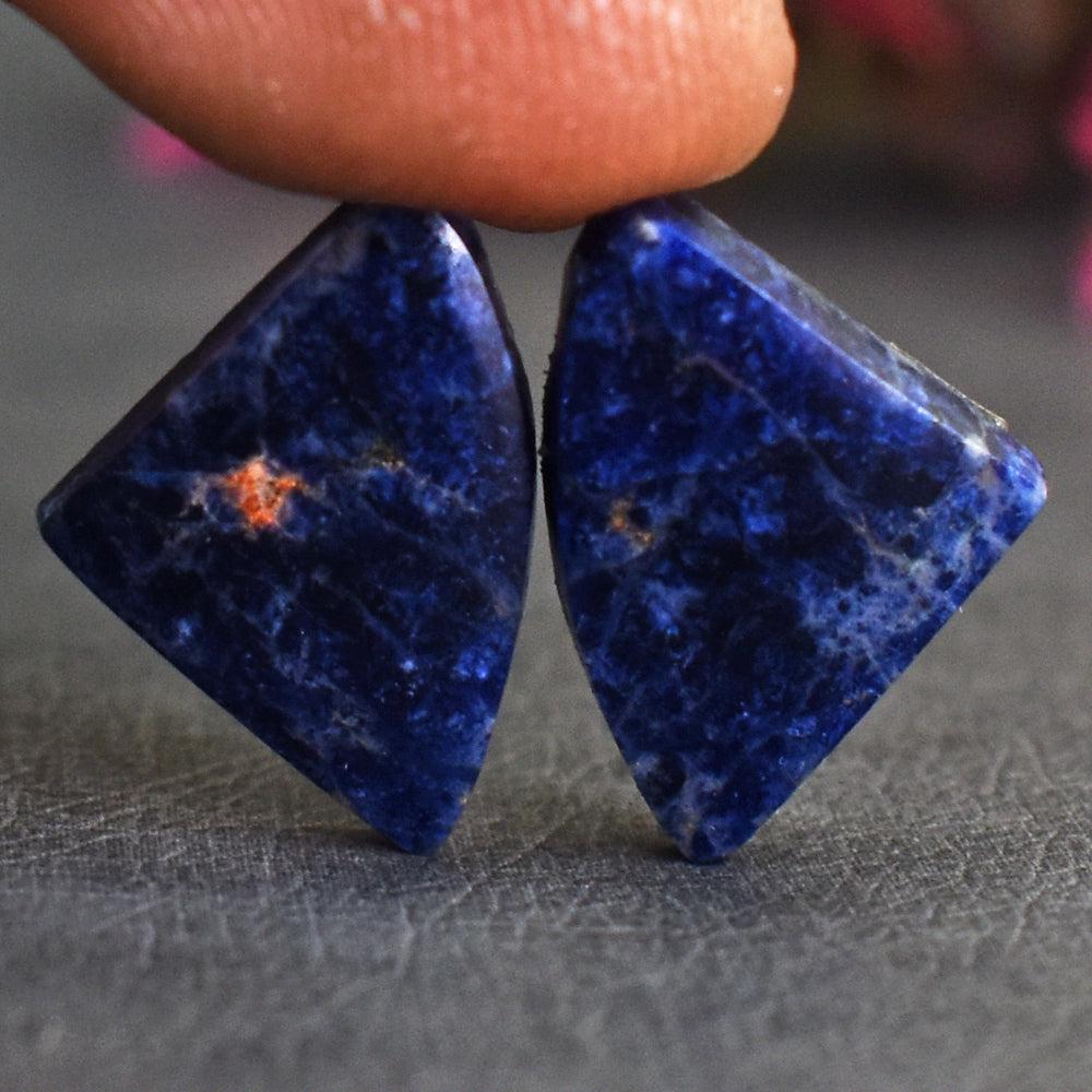 Exclusive 6 Carats Genuine Sodalite Gem's Pair Gemstone: Product : Natural Sodalite Gem's Pair Gemstone Weight : 6.00 Carats Color : As seen in picture Treatment : NoneDimensions : 15 X 10 X 03 MM Clarity : Opaque Code : 23 C4 (AL)Natural Sodalite Gem's Pai
