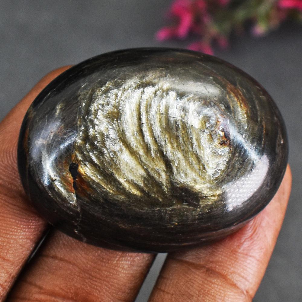 Beautiful 95 Cts Genuine Golden Obsidian Cabochon: Product : Natural Golden Obsidian Gemstone Weight : 95.00 Carats Color : As seen in picture Treatment : NoneDimensions : 39 X 29 X 10 MM Clarity : Opaque Code : 8 C4 (AL)Natural Golden Obsidian Gemsto