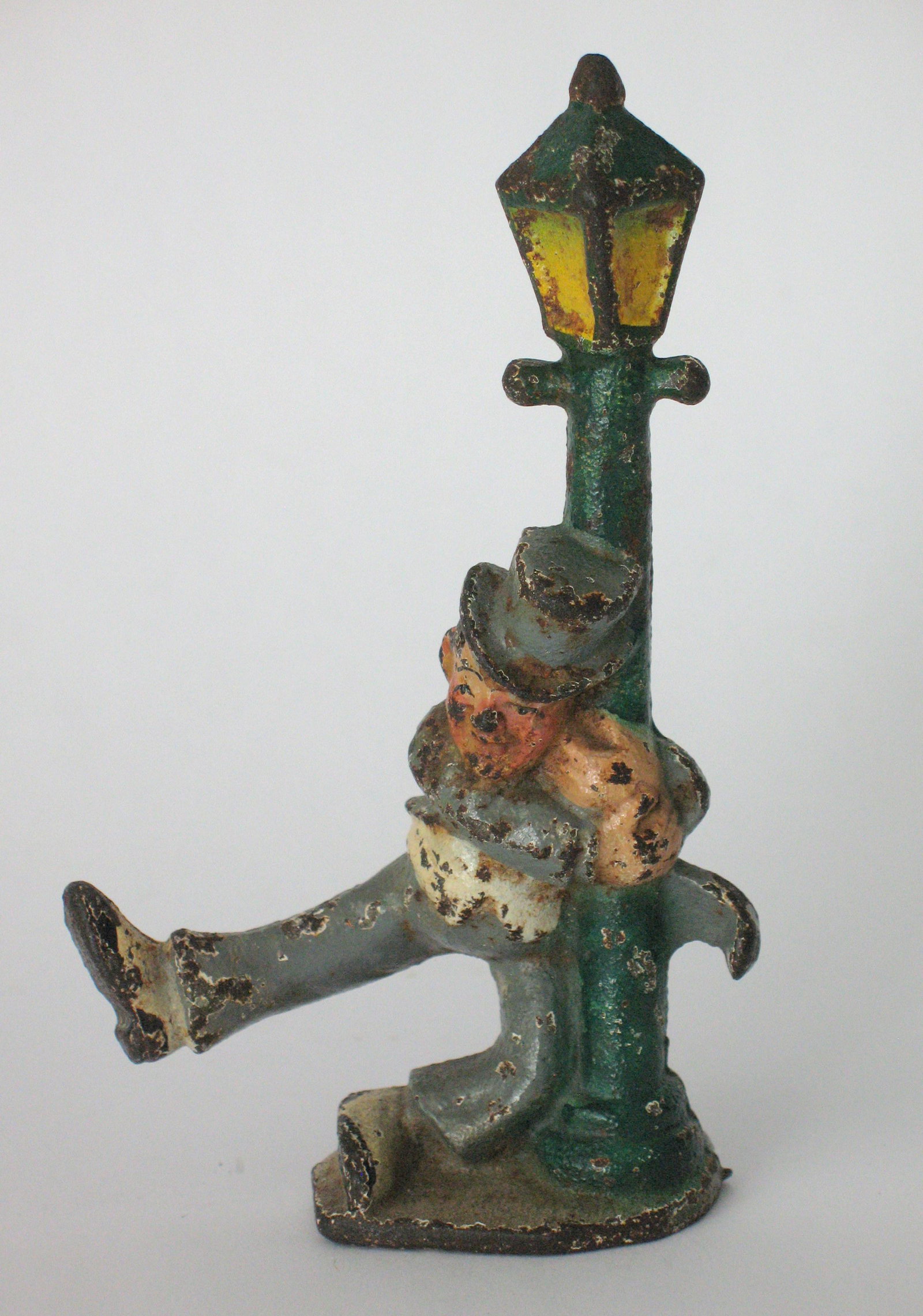 Vintage cast iron “Drunk at the lamppost”. (1 of 2)