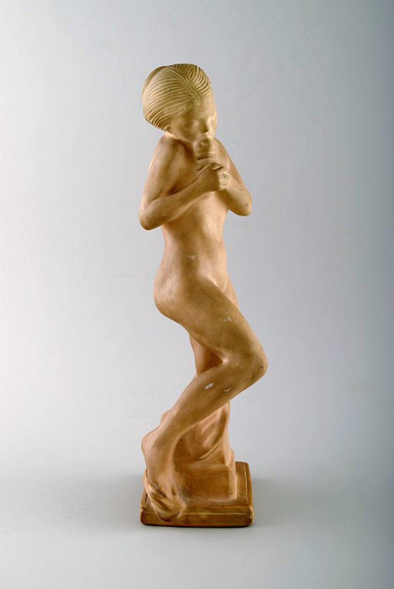 Kai Nielsen for Kähler. "Eve with the apple" Figure in earthenware.: Title: Kai Nielsen for Kähler. "Eve with the apple" Figure in earthenware. Brand: Kähler Description: Kai Nielsen for Kähler. "Eve with the apple" Figure in earthenware. Signed HAK Denm