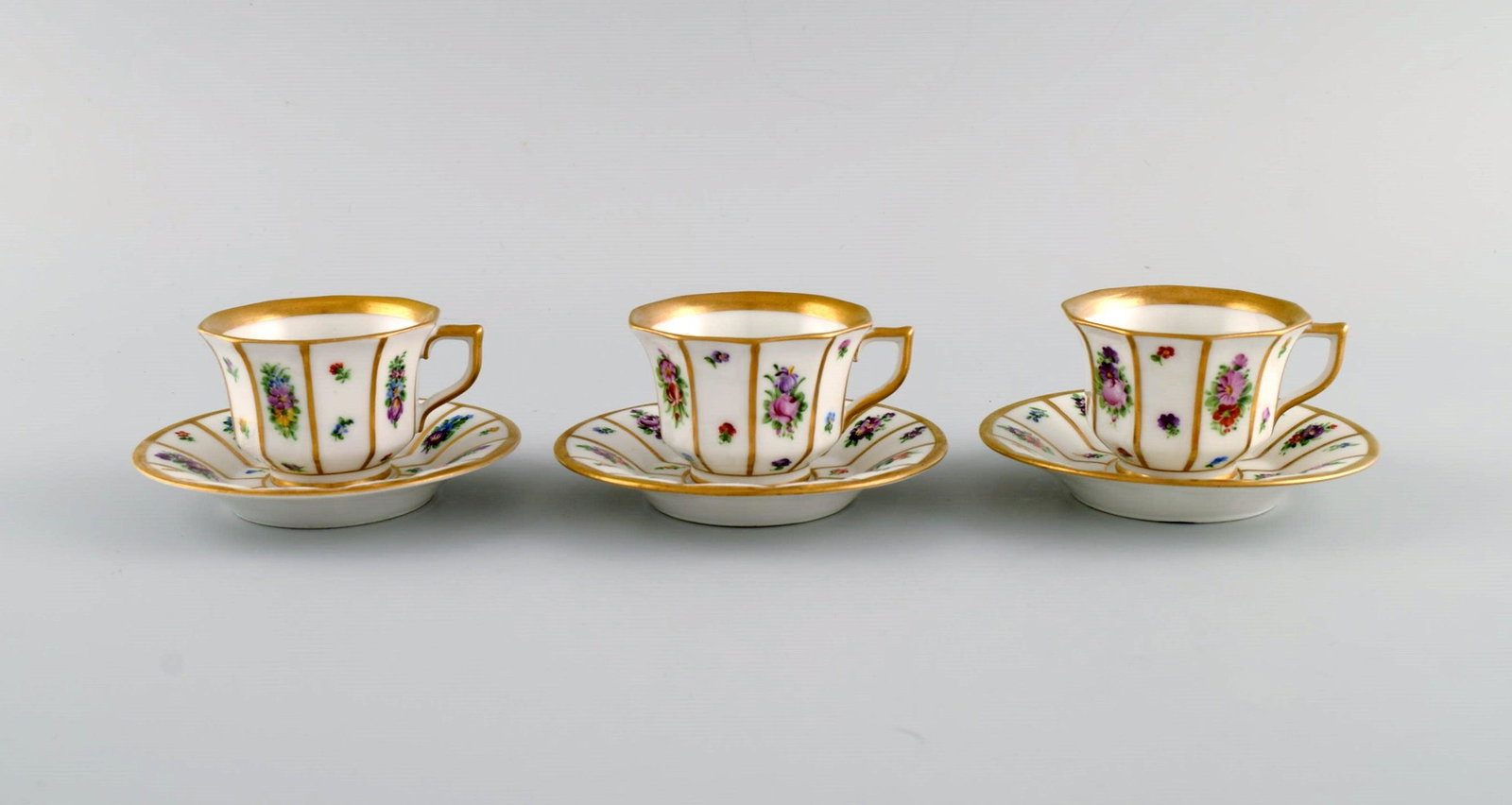 Three Royal Copenhagen Henriette mocha cups with saucers in hand-painted porcelain with flowers and (1 of 6)