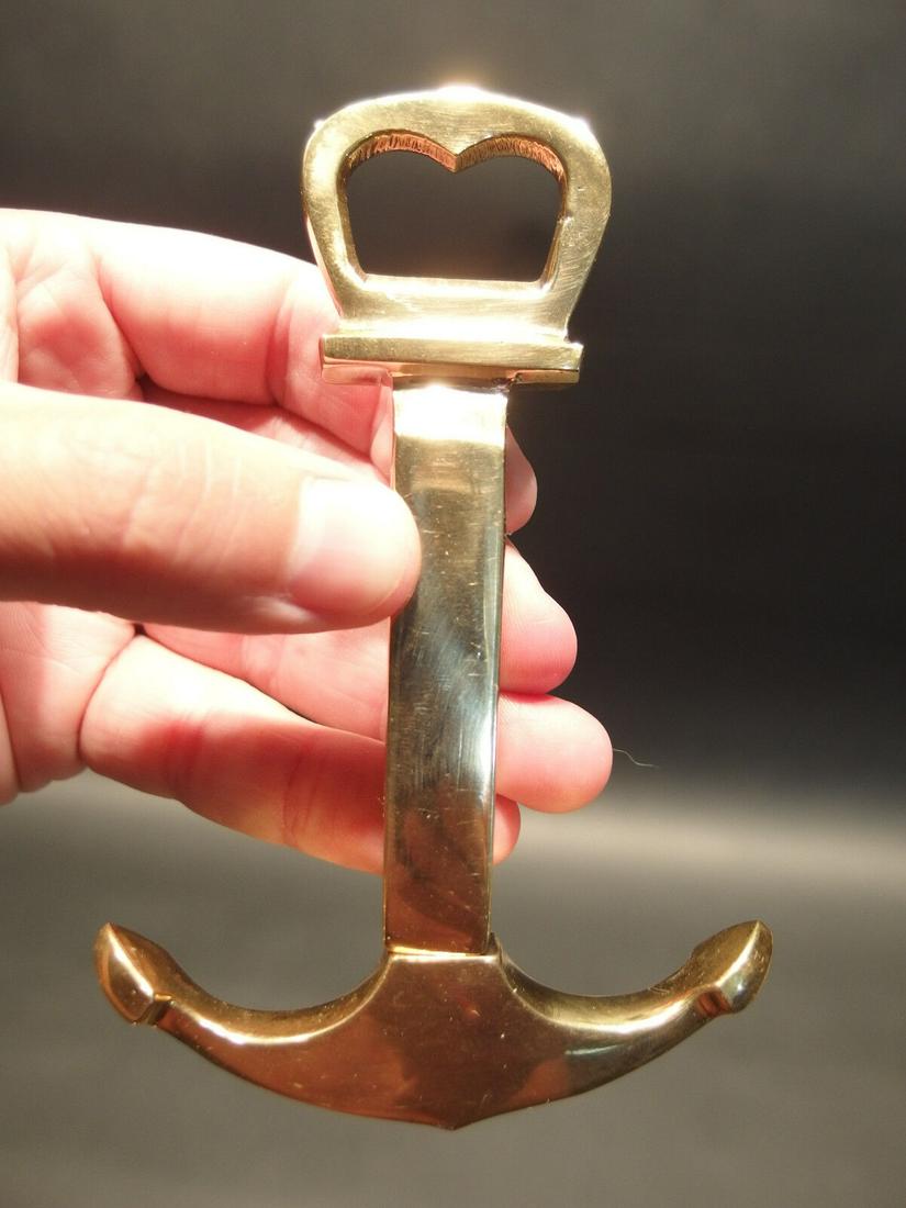 Brass Nautical Ships Boat Anchor Wine Beer Bottle Opener: 4 7/8" long x 3 1/8" Wide Very accurate and well made reproduction of an antique wine and beer bottle opener. All solid brass! Certainly easy to wonder its age Reserve: $16.00 Shipping: Domestic: Flat