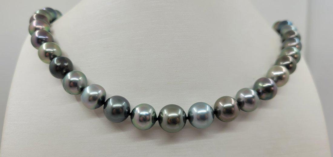 Certified Aurora Peacock - 8.3x11.4mm Multi Tahitian Pearls - Necklace: Title: Certified Aurora Peacock - 8.3x11.4mm Multi Tahitian Pearls - Necklace Description: Special Appellation: Aurora Peacock This necklace is in the category of the strongest Teri according to the t