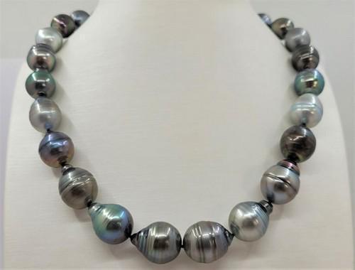 12x16mm Large Multi Peacock Tahitian Pearls - Necklace: Title: 12x16mm Large Multi Peacock Tahitian Pearls - Necklace Description: A luxury pearl necklace, made with baroque shaped Tahitian pearls, and completed with a solid silver clasp. Tahitian pearls a