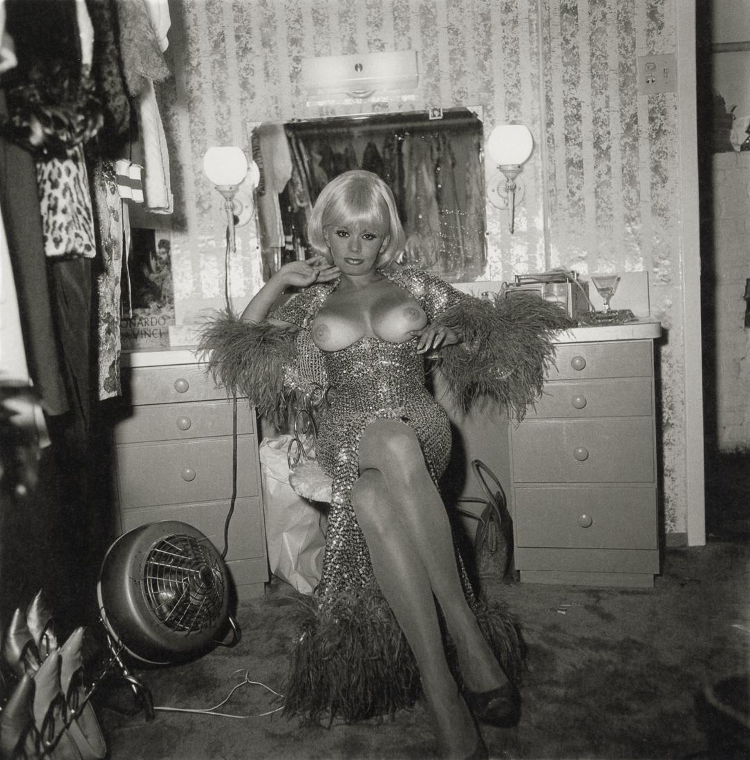 DIANE ARBUS - Topless Dancer In Her Dressing Room: Artist: Diane Arbus Title: Topless Dancer In Her Dressing Room, San Francisco, CA, 1968 Medium: Photo Litho, 2003, Germany Dimensions: 8.15x8.25" Description: Heat Wax Mounted on 11x14" Conservation B