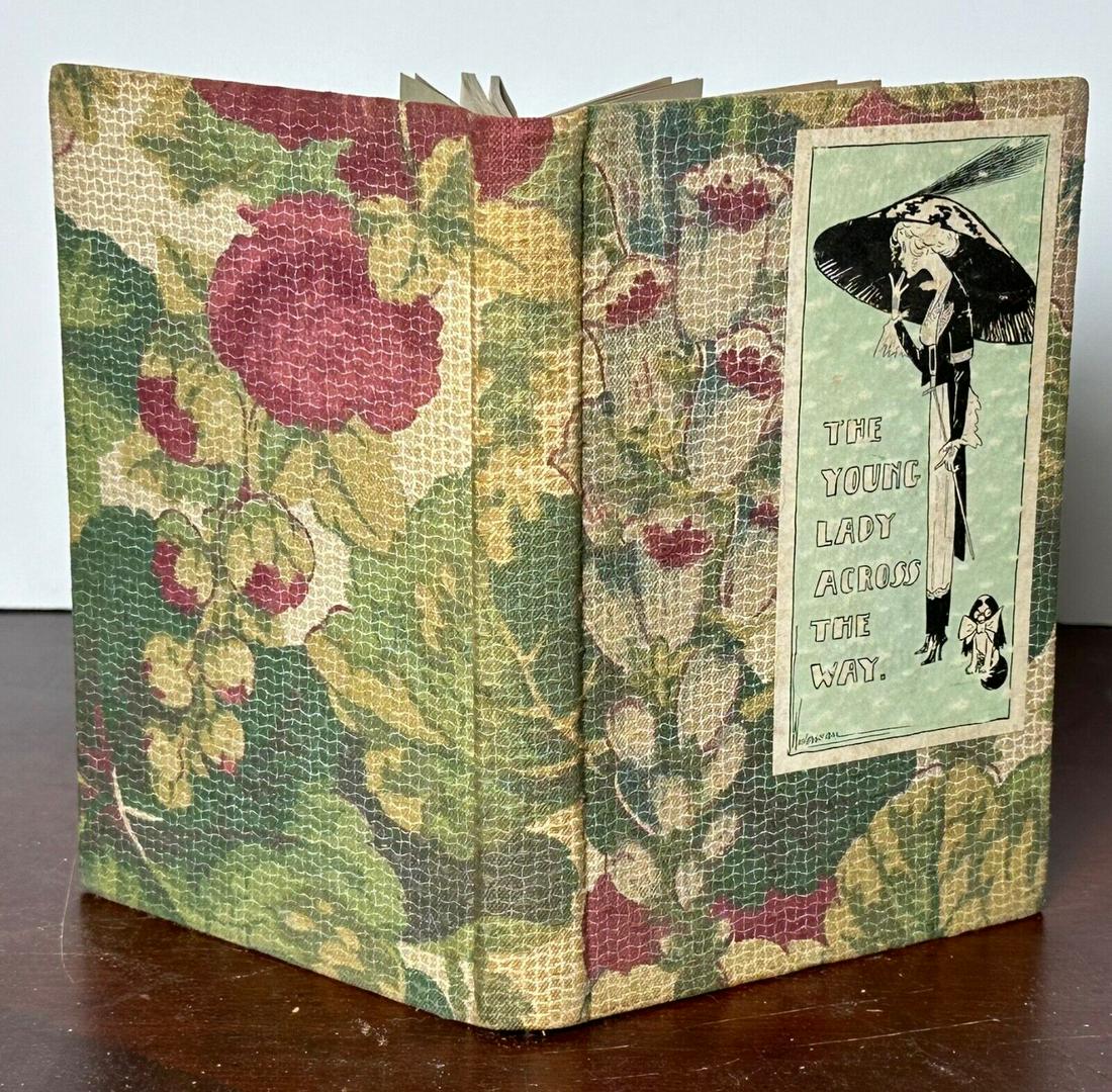 The Young Lady Across the Way Robert Ryder Westerman Illustrations 1913 Cartoon: This is the John W. Luce & Co. 1913 printing (not a first) of Robert O. Ryder and Harry J. Westerman's The Young Lady Across the Way (unpaginated). This is in very good overall condition, with little 