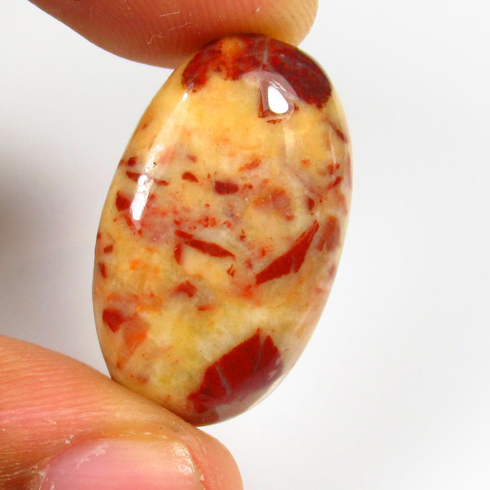 Natural Jasper Quartz - 20.05 Ct: No Reserve! Title: Natural Jasper Quartz - 20.05 Ct Origin: Brazil Weight: 20.05 Size/Dimensions: 23.0 x 16.5 x 6.0 mm Additional Information: Pieces : 1 No's / Shape : Oval Cabochon / Color : Orange
